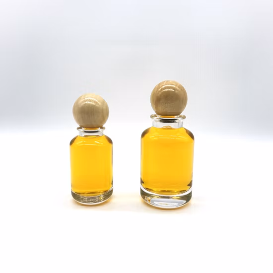 50ml 100ml 円筒形ガラス香水瓶、丸い木製キャップ付き